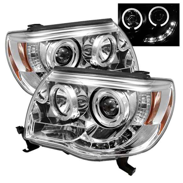 5011923 Driver and Passenger Side Halogen Headlight, With bulb(s), Clear Lens, Chrome Interior, Signature Series