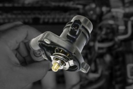 Thermostat Housing: Leak Causes, Replacement Cost, Symptoms