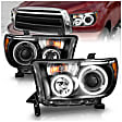 111174 Driver and Passenger Side Halogen Headlight, With bulb(s), Clear Lens, Black Interior, Halo Projector Series