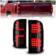 311451 Driver and Passenger Side LED Tail Light, With bulb(s), Smoked Lens, Black Interior, OE Replacement Series
