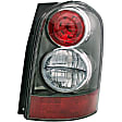 1611355 Passenger Side Halogen Tail Light, Without bulb(s), Clear & Red Lens