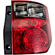 1611459 Passenger Side Halogen Tail Light, Without bulb(s), Clear & Red Lens