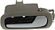 Front, Passenger Side Gray bezel with chrome lever Interior Door Handle