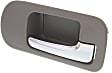 Front, Passenger Side Brown bezel with chrome lever Interior Door Handle