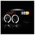 5010131 Driver and Passenger Side Halogen Headlight, With bulb(s), Clear Lens, Black Interior, Signature Series