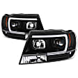 5085221 Driver and Passenger Side Halogen Headlight, With bulb(s), Clear Lens, Black Interior, Signature Series