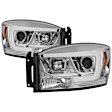 5085290 Driver and Passenger Side Halogen Headlight, With bulb(s), Clear Lens, Chrome Interior, Signature Series
