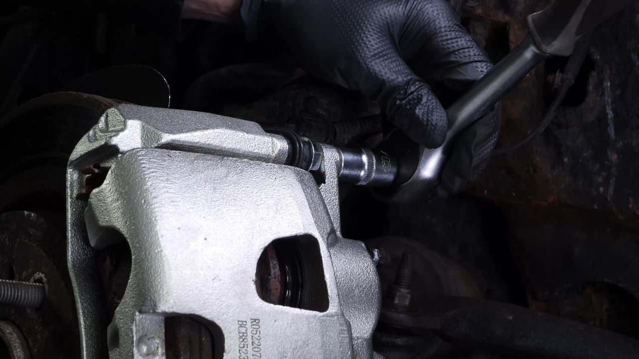 Remove the  brake caliper