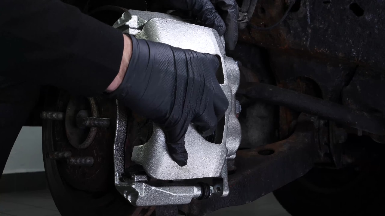 Remove the  brake caliper