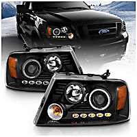 111028 Driver and Passenger Side Headlight, With bulb(s) - Clear Lens Black Interior, Halogen Projector, 1 LED Halo