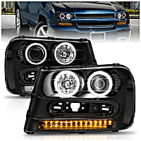 111127 Driver and Passenger Side Halogen Headlight, With bulb(s), Clear Lens, Black Interior, Halo Projector Series