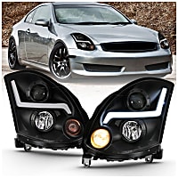 121557 Driver and Passenger Side Halogen Headlight, With bulb(s), Clear Lens, Black Interior, Projector Series