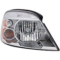 1591140 Passenger Side Halogen Headlight, With bulb(s), Clear Lens