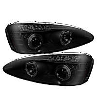 5078629 Driver and Passenger Side Halogen Headlight, With bulb(s), Smoked Lens, Black Interior, Signature Series