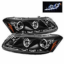 5010667 Driver and Passenger Side Halogen Headlight, With bulb(s), Clear Lens, Black Interior, Signature Series